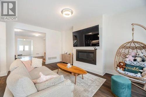 64 Macklin Street, Brantford, ON - Indoor Photo Showing Living Room With Fireplace