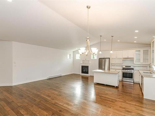 10296 Sparling Pl, Sidney, BC - Indoor Photo Showing Kitchen With Fireplace With Upgraded Kitchen