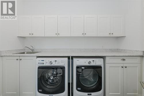 Great laundry room with lots of storage and a wash sink. - 10296 Sparling Pl, Sidney, BC 