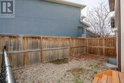 There’s a thoughtfully fenced-off dog run for pet lovers, ensuring your furry friends have a dedicated space - 111 Sage Hill Green Nw, Calgary, AB 