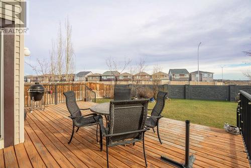 Step into your private oasis with a spacious, pie-shaped backyard that sets this home apart - 111 Sage Hill Green Nw, Calgary, AB 