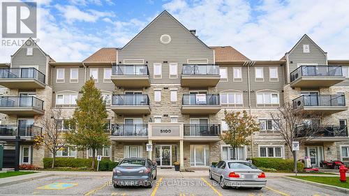 211 - 5100 Winston Churchill Boulevard, Mississauga, ON - Outdoor With Balcony With Facade