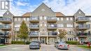 211 - 5100 Winston Churchill Boulevard, Mississauga, ON  - Outdoor With Balcony With Facade 