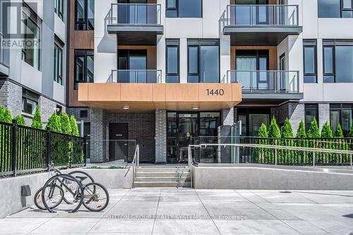 317 - 1440 Clarriage Court, Milton, ON - Outdoor With Facade