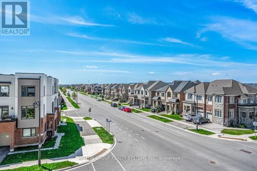 317 - 1440 Clarriage Court, Milton, ON - Outdoor With Facade