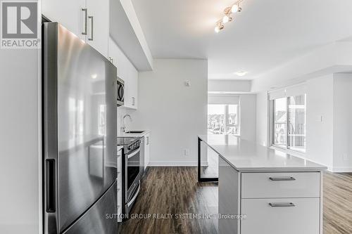 317 - 1440 Clarriage Court, Milton, ON - Indoor Photo Showing Kitchen With Upgraded Kitchen