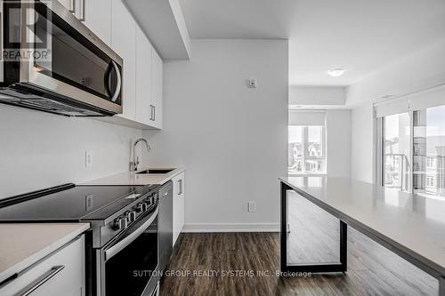 317 - 1440 Clarriage Court, Milton, ON - Indoor Photo Showing Kitchen