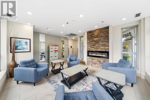 405 - 2464 Weston Road, Toronto, ON - Indoor Photo Showing Living Room With Fireplace