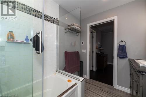 Bathroom featuring shower with separate bathtub and vanity - 361 1St Avenue S, Chesley, ON - Indoor Photo Showing Bathroom