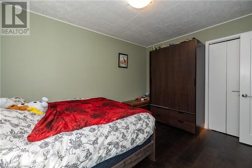 Bedroom with dark hardwood / wood-style floors - 361 1St Avenue S, Chesley, ON - Indoor Photo Showing Bedroom