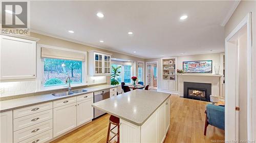 29 Holiday Drive, Rothesay, NB - Indoor Photo Showing Kitchen With Fireplace With Double Sink