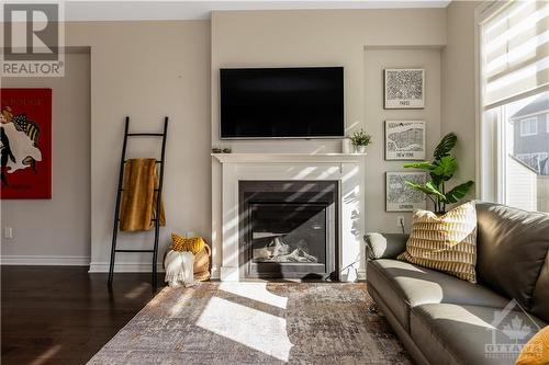 318 Cosanti Drive, Stittsville, ON - Indoor Photo Showing Living Room With Fireplace