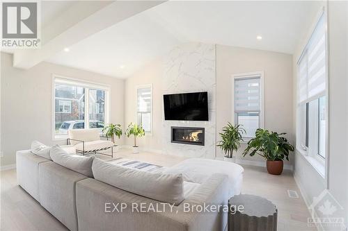 2080 Elevation Road, Ottawa, ON - Indoor Photo Showing Living Room With Fireplace