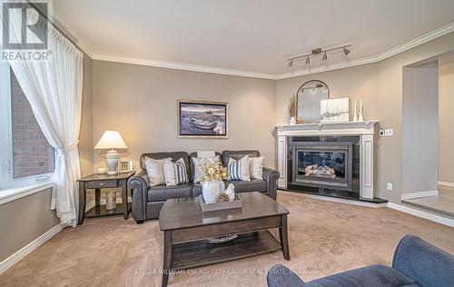 263 Pigeon Creek Road, Kawartha Lakes (Janetville), ON - Indoor Photo Showing Living Room With Fireplace