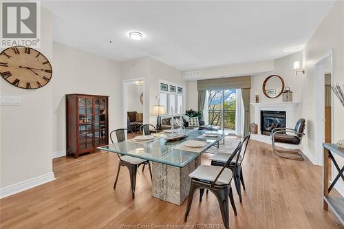 200 Manning Road Unit# 406, Tecumseh, ON - Indoor Photo Showing Dining Room With Fireplace