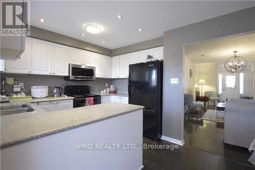 310 Black Drive, Milton, ON - Indoor Photo Showing Kitchen With Double Sink