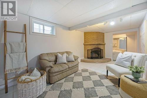 144 Baseline Road W, London, ON - Indoor Photo Showing Living Room With Fireplace