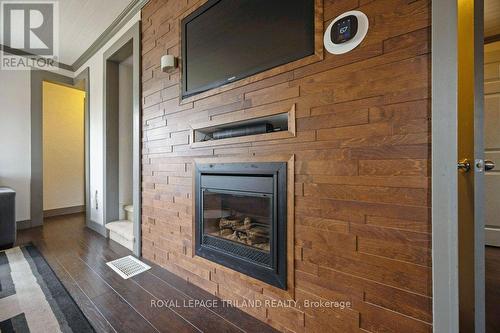 144 Baseline Road W, London, ON - Indoor Photo Showing Other Room With Fireplace