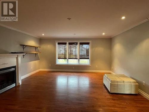 10 Tompkins Avenue, Stephenville, NL - Indoor Photo Showing Other Room With Fireplace