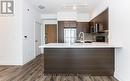 1606 - 65 Speers Road, Oakville, ON  - Indoor Photo Showing Kitchen With Stainless Steel Kitchen 