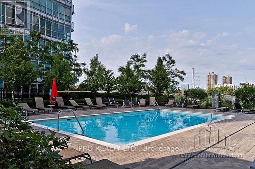 408 - 155 Legion Road N, Toronto, ON - Outdoor With In Ground Pool With Backyard