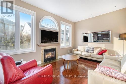 119 Whitestone Drive, Ottawa, ON - Indoor Photo Showing Living Room With Fireplace