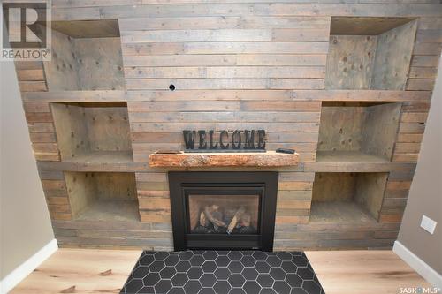 211 Victor Terrace, Dalmeny, SK - Indoor With Fireplace