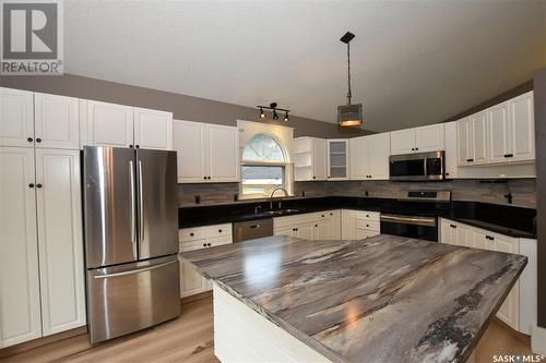 211 Victor Terrace, Dalmeny, SK - Indoor Photo Showing Kitchen With Stainless Steel Kitchen With Double Sink