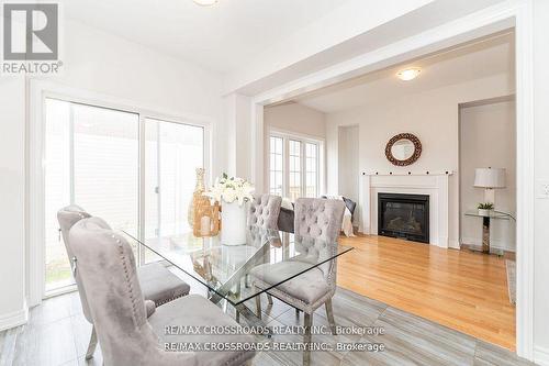 48 Blackwell Crescent, Bradford West Gwillimbury, ON - Indoor Photo Showing Dining Room With Fireplace