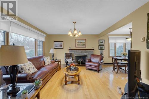 663 Hampton Road, Quispamsis, NB - Indoor Photo Showing Living Room With Fireplace