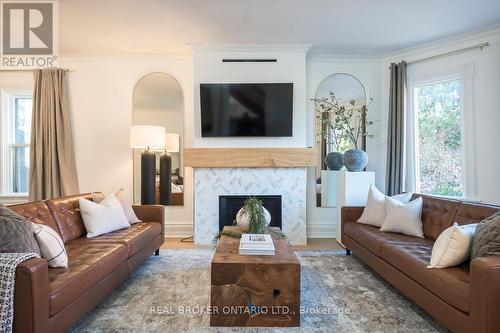 39 Henderson Street, Centre Wellington, ON - Indoor Photo Showing Living Room With Fireplace