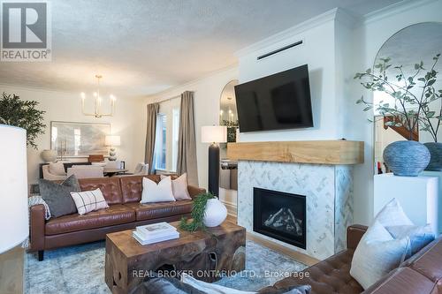 39 Henderson Street, Centre Wellington, ON - Indoor Photo Showing Living Room With Fireplace