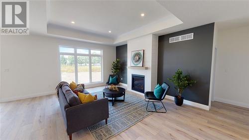 654 Ketter Way, Plympton-Wyoming, ON - Indoor Photo Showing Living Room With Fireplace