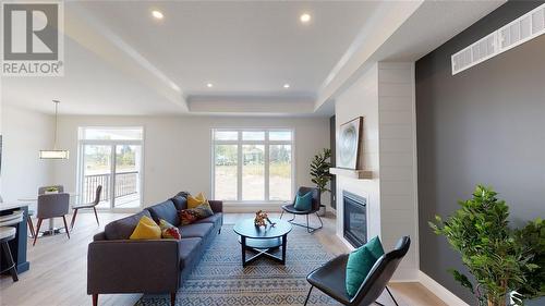 654 Ketter Way, Plympton-Wyoming, ON - Indoor Photo Showing Living Room With Fireplace