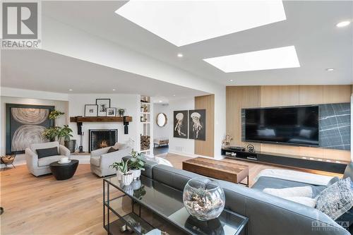 2704 River Road, Ottawa, ON - Indoor Photo Showing Living Room With Fireplace