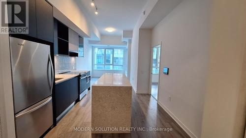 227 - 395 Dundas Street W, Oakville, ON - Indoor Photo Showing Kitchen With Stainless Steel Kitchen