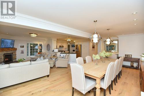 13 - 3333 New Street, Burlington, ON - Indoor Photo Showing Dining Room With Fireplace