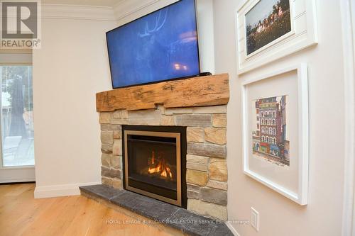 13 - 3333 New Street, Burlington, ON - Indoor Photo Showing Other Room With Fireplace