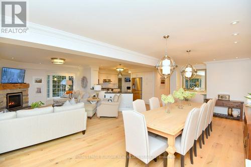 13 - 3333 New Street, Burlington, ON - Indoor Photo Showing Dining Room With Fireplace