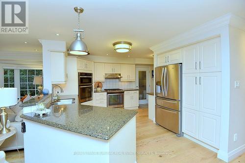 13 - 3333 New Street, Burlington, ON - Indoor Photo Showing Kitchen With Double Sink