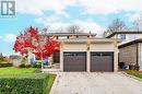 View of front of property with a garage - 2401 Coventry Way, Burlington, ON 