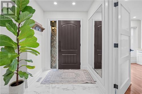 Entrance foyer featuring light wood-type flooring - 2401 Coventry Way, Burlington, ON 