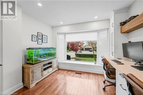 Home office with light hardwood / wood-style floors - 2401 Coventry Way, Burlington, ON 