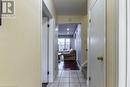 Hallway featuring light hardwood / wood-style floors - 48 Windom Road Unit# E, Kitchener, ON 