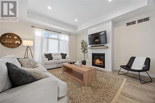 613 Ketter Way, Plympton-Wyoming, ON - Indoor Photo Showing Living Room With Fireplace