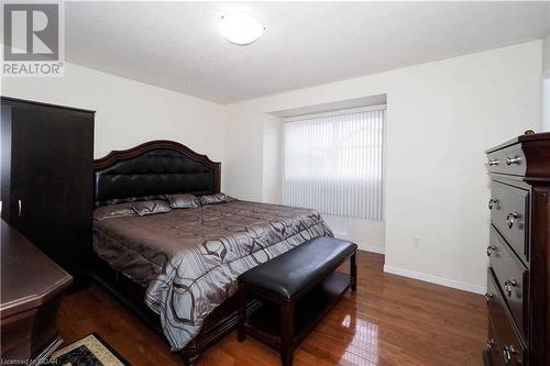 Bedroom featuring dark hardwood / wood-style floors - 89 Garth Massey Drive, Cambridge, ON - Indoor Photo Showing Bedroom