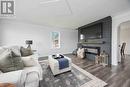 7043 Base Line Road, Wallaceburg, ON  - Indoor Photo Showing Living Room With Fireplace 