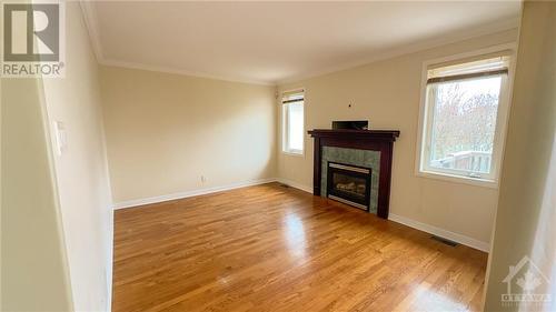 Family Room - 59 Montana Way, Ottawa, ON - Indoor Photo Showing Living Room With Fireplace