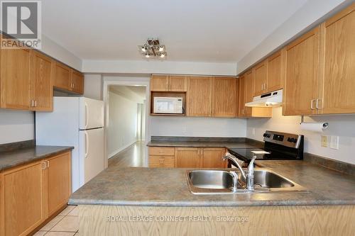 2761 Bur Oak Avenue, Markham, ON - Indoor Photo Showing Kitchen With Double Sink