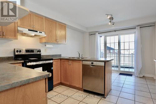 2761 Bur Oak Avenue, Markham, ON - Indoor Photo Showing Kitchen With Double Sink